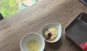 Japanese mayo, gochujang, honey and seasonings in a small bowl for the katsu sauce